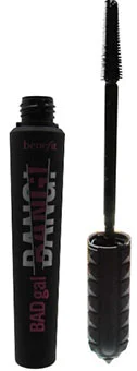 A close up image of Benefit Cosmetics BADgal BANG Bigger, Badder Volumizing Mascara showcasing the distinctive black tube and the mascara wand with bristles. The packaging features bold typography, highlighting the product's name.