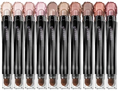 A set of ten  LUXAZA PRO eyeshadow sticks in various shades, arranged neatly in a row, featuring smooth applicators and elegant black packaging.