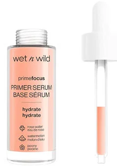 A bottle of Wet n Wild Prime Focus Primer Serum for Face with a label that reads PRIMER SERUM BASE SÉRUM and details about hydration benefits, accompanied by a dropper for easy application.